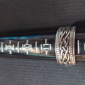 Preloved stainless steel Celtic silver band.